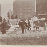 Blizzard of 1899. "Men shoveling snow into a horse drawn cart looking north at Broadway and 42nd Street."